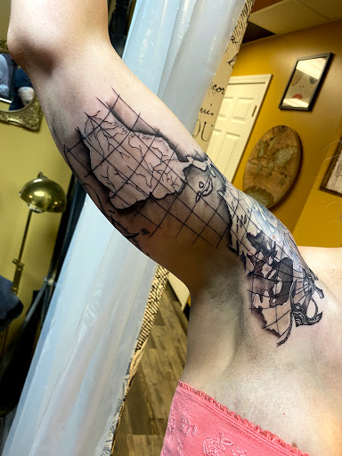 Explore flower bouquet tattoo ideas, creative tattoo ideas in Warner Robins, available at Untold Pain Tattoo Studio