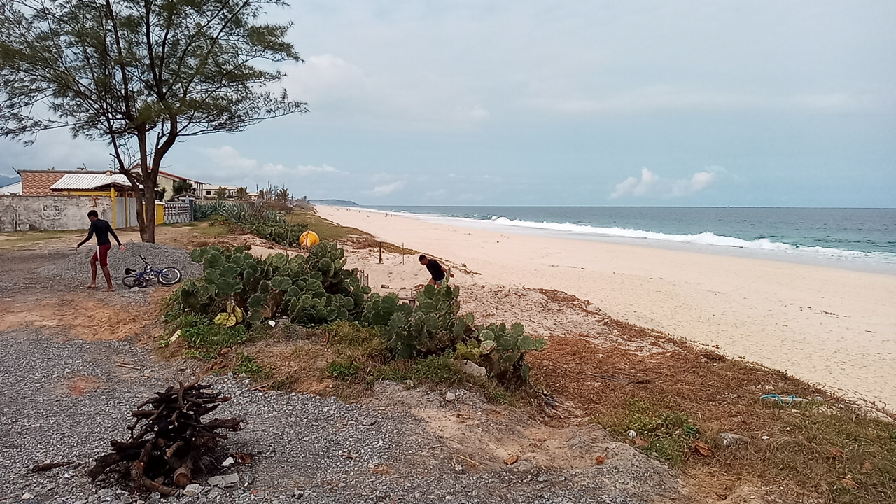 Photo of Guaratiba Beach and the settlement