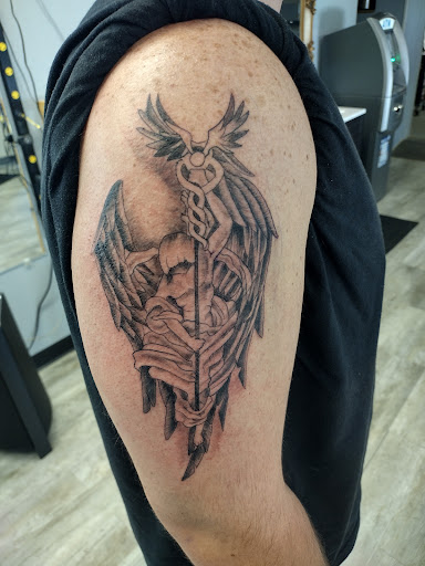 Explore mom tattoo ideas for men, creative tattoo ideas in La Crosse, available at La Crosse Tattoo