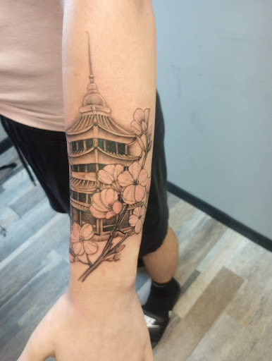 Explore cover up tattoo ideas female arm, creative tattoo ideas in Cambridge, available at Branded Tattoo Co