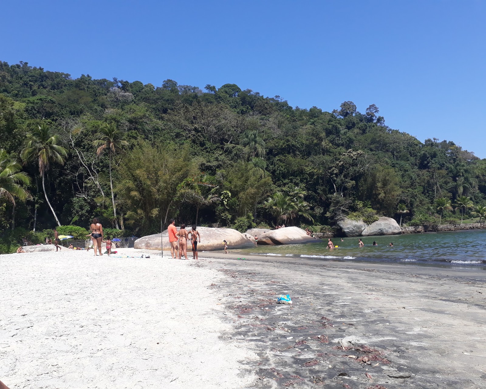 Foto de Cantinho da Bia Praia Grande com água cristalina superfície