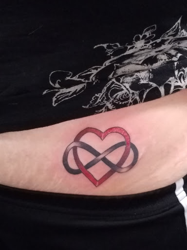 Explore line tattoo ideas, creative tattoo ideas in New Hartford, available at Bodily Charm Tattoo & Piercing