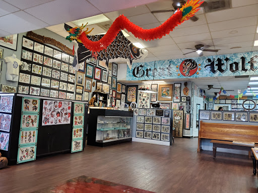 Explore leg tattoos idea, creative tattoo ideas in Greenville, available at Great Wolf Tattoo