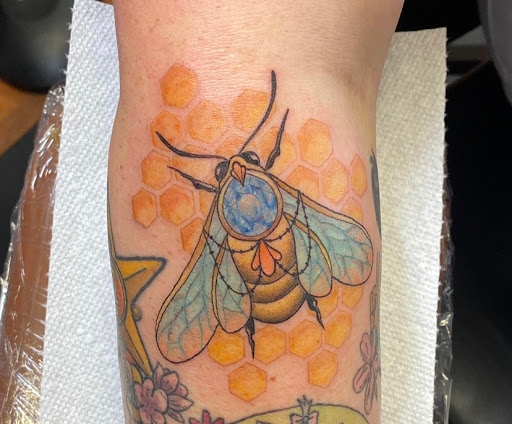 Explore cover up tattoo ideas for upper back, creative tattoo ideas in Fort Wayne, available at FullBloom Tattoos