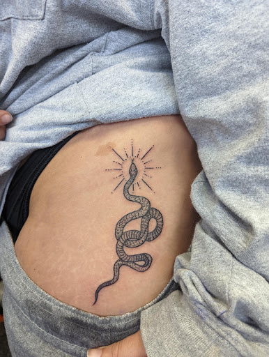 Explore 2002 tattoo ideas, creative tattoo ideas in Slippery Rock, available at Dinky Dachshund Tattoo Parlor