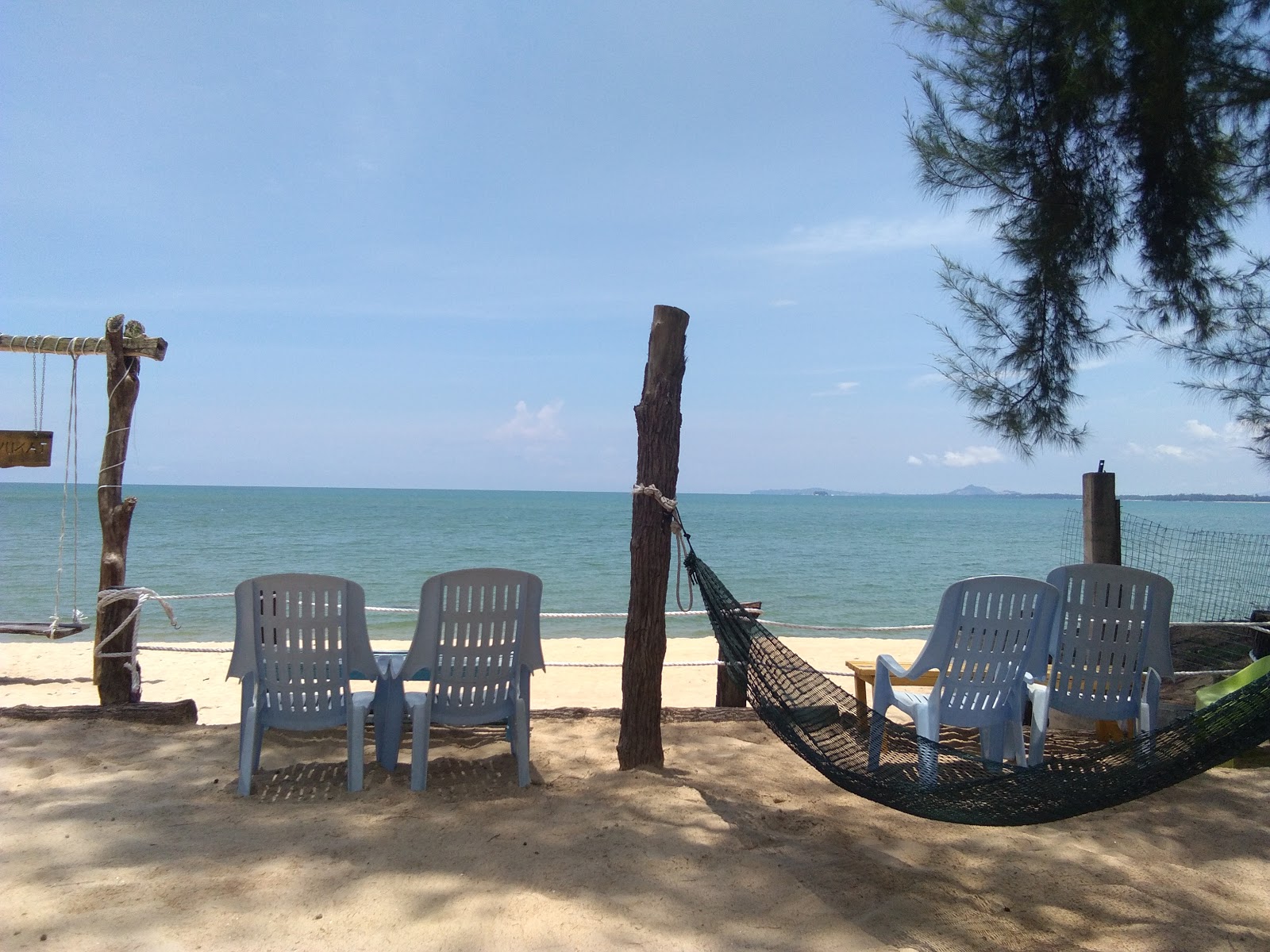 Photo of Cherating Beach surrounded by mountains