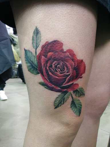 Explore palm size tattoos ideas, creative tattoo ideas in Chapel Hill, available at Golden Falcon Tattoo and Piercing