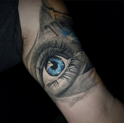 Explore star tattoo ideas for females, creative tattoo ideas in Dothan, available at Dinosaur Tattoo Company