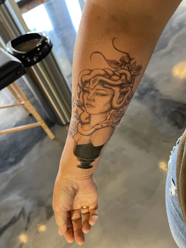 Explore rayquaza tattoo ideas, creative tattoo ideas in College Station, available at Sacred Sisters Tattoo Studio