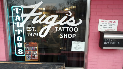 Explore letter tattoo cover up ideas, creative tattoo ideas in Longview, available at Fugis Tattoo Shop