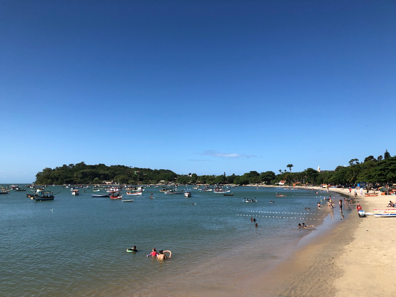 Foto av Trapiche Beach med beige sand yta