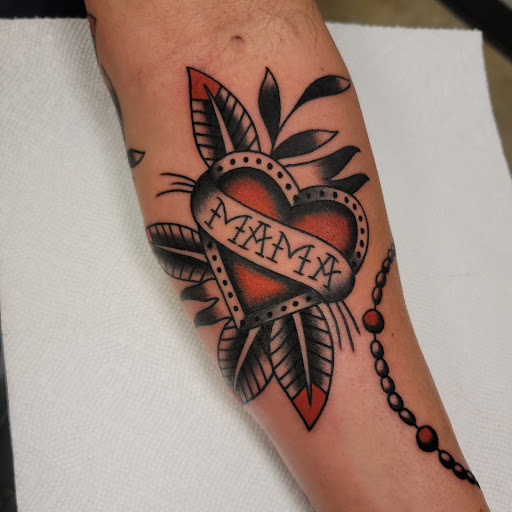 Explore family tree tattoo ideas for females, creative tattoo ideas in Painesville, available at The Inkwell Tattoo Company