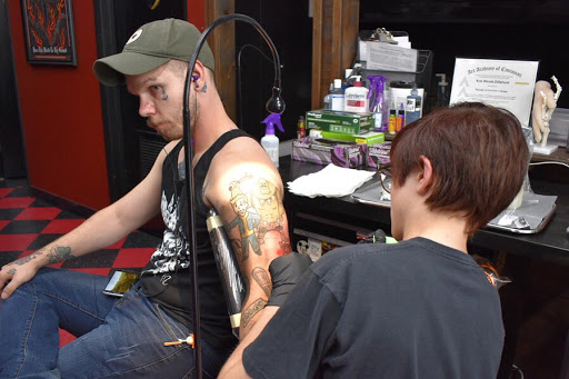 Find creative number tattoo ideas for your next unique tattoo in Dayton at 33 Lions Tattoo