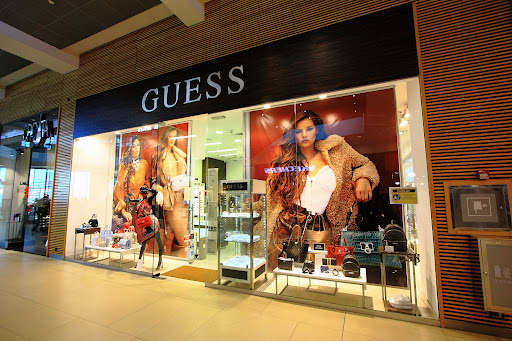 Stores to buy women's guess sneakers Calgary