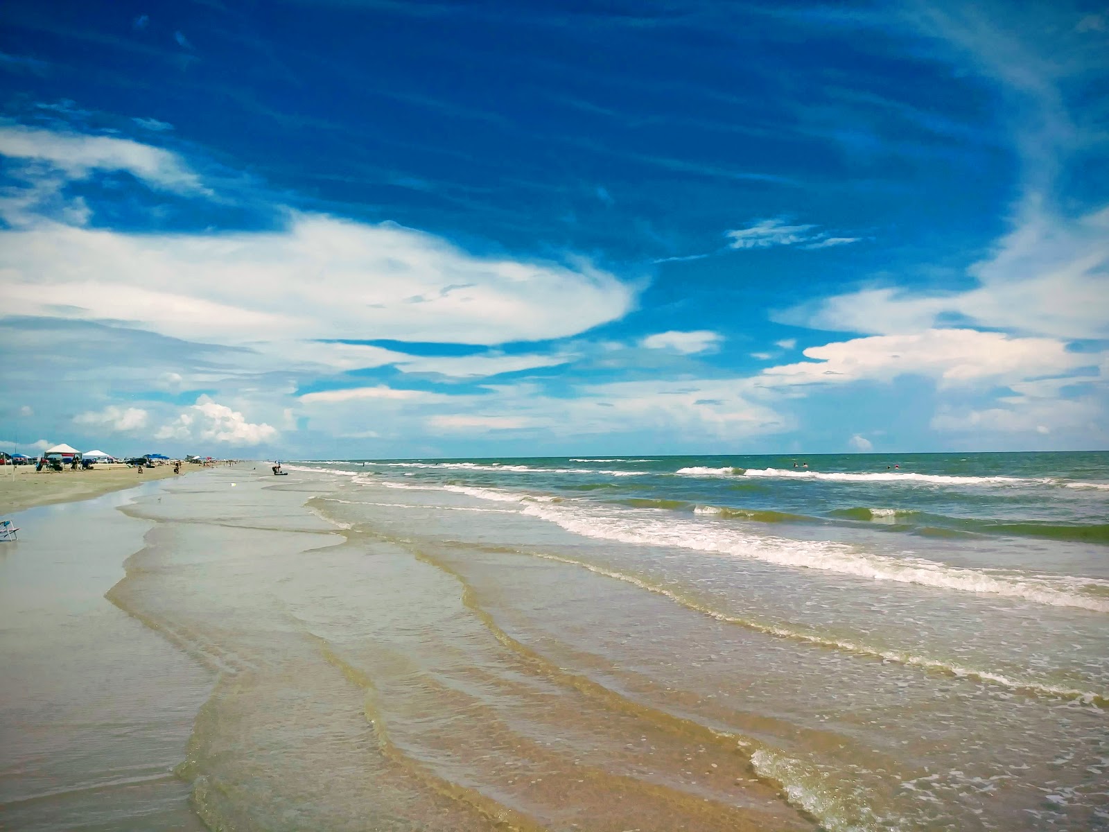 Foto van Surfside Brazoria beach met helder zand oppervlakte