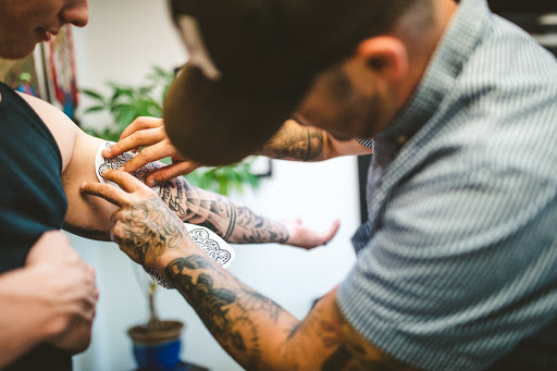 Explore cross tattoos ideas, creative tattoo ideas in New Cumberland, available at American Anchor Tattoo Co.