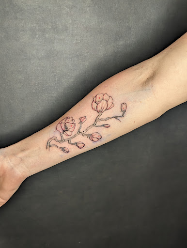 Explore rip tattoos ideas, creative tattoo ideas in New Orleans, available at Catahoula Tattoo 