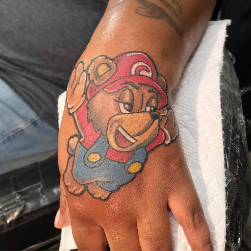 Tattoo Shop «Royal Flush Tattoos», reviews and photos, 2600 Poplar Ave, Memphis, TN 38112, USA