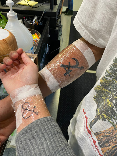 Explore swirl tattoo ideas, creative tattoo ideas in Anchorage, available at Body Piercing Unlimited