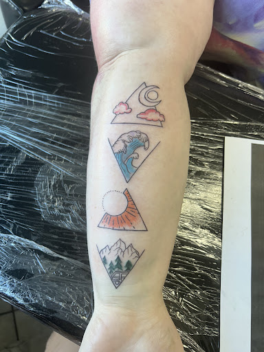 Explore hunting tattoo sleeve ideas, creative tattoo ideas in Daytona Beach, available at Studio 21 Tattoo & Piercings Daytona Beach