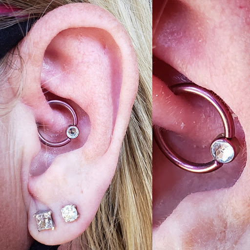 Explore black and white voodoo/ragdoll broken heart tattoo ideas, creative tattoo ideas in Kokomo, available at Beatnik piercing & jewelry