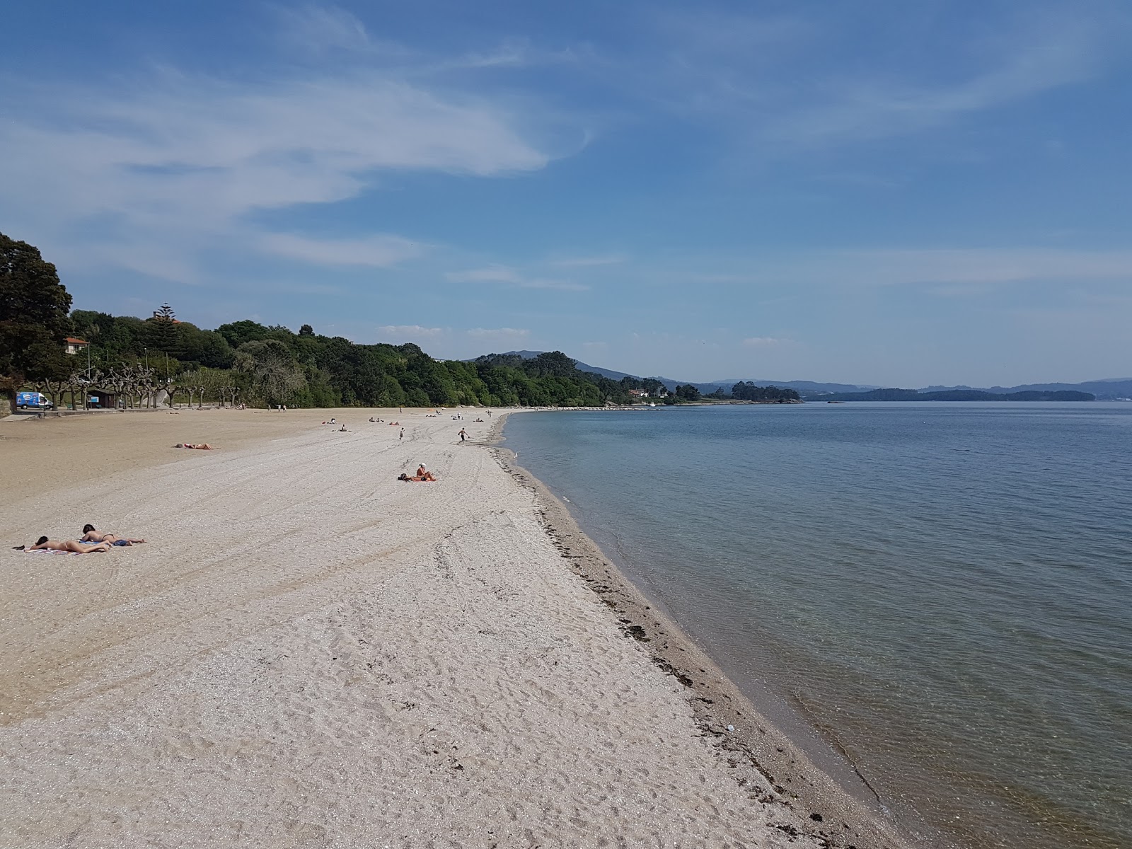 Fotografija Tanxil beach z svetel pesek površino