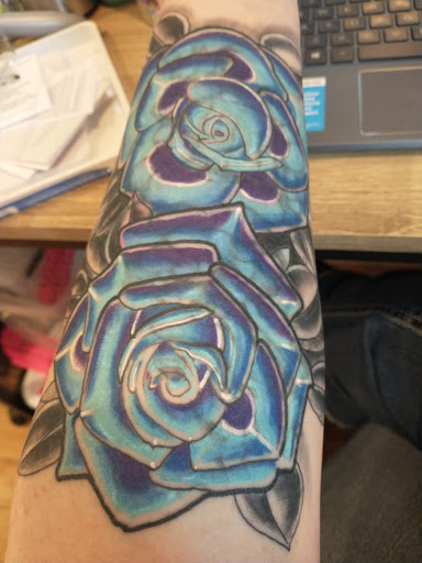 Explore tattoo ideas for women wrist, creative tattoo ideas in Washburn, available at Elevated Vision Tattoo Studio