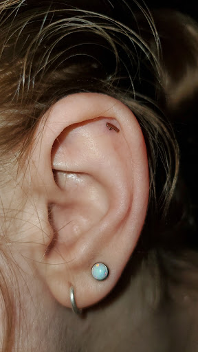 Explore simple neck tattoo ideas, creative tattoo ideas in Virginia Beach, available at KIVA Fine Jewelry & Body Piercing