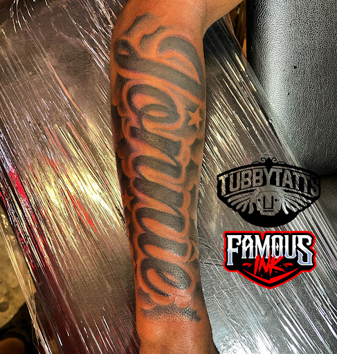 Explore father and son tattoos ideas, creative tattoo ideas in Hammond, available at Famous Ink, Inc.