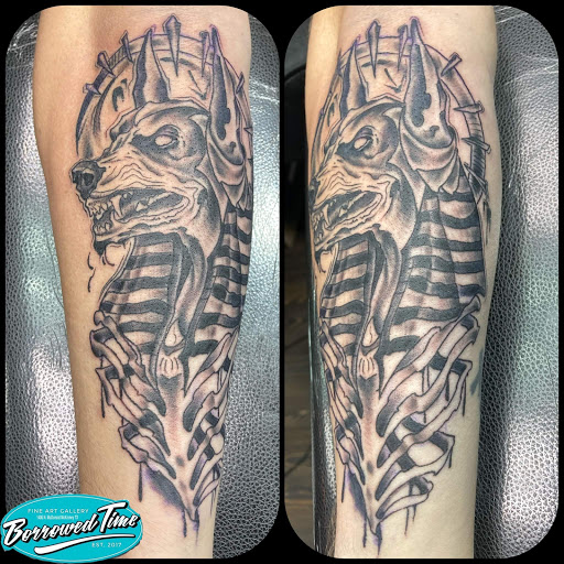 Explore snake tattoo ideas for men, creative tattoo ideas in Mckinney, available at Borrowed Time Fine Art Gallery Tattoo Shop