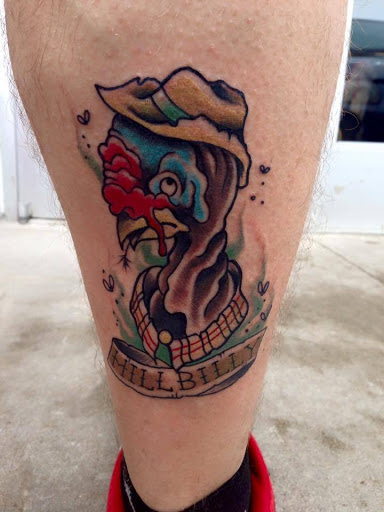 Tattoo Shop «Attitudes Muskegon», reviews and photos, 1610 Evanston Ave, Muskegon, MI 49442, USA