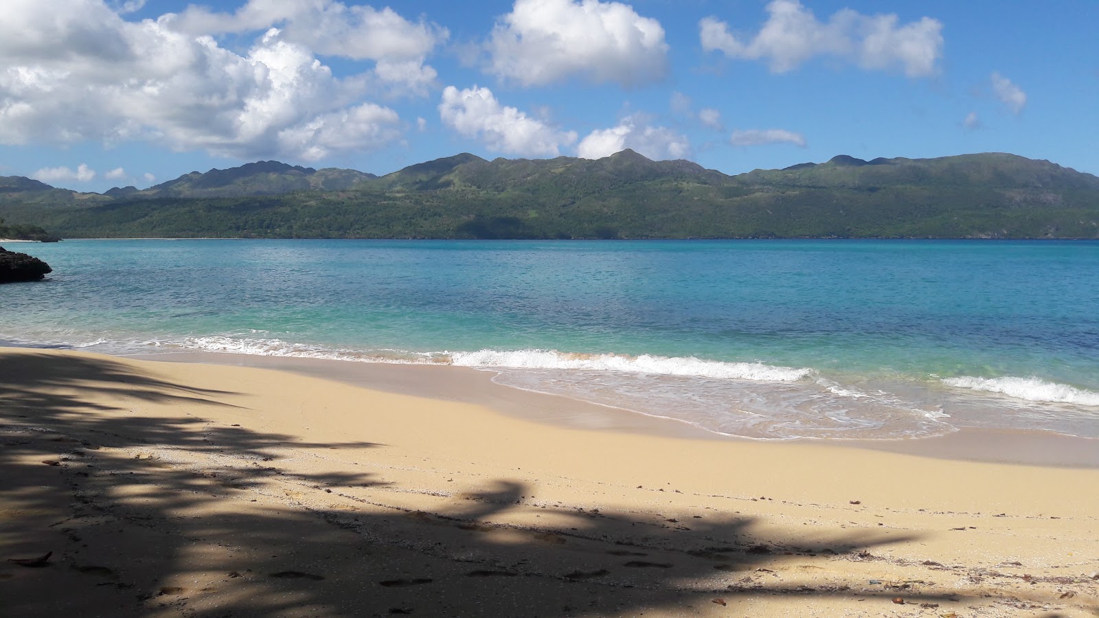 Foto van Playa el Ermitano met turquoise puur water oppervlakte