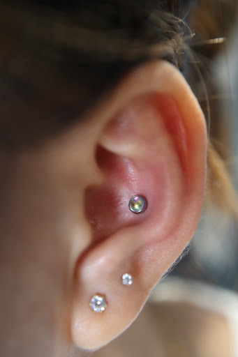 Explore wrap tattoo ideas, creative tattoo ideas in Mobile, available at Old Familiar Tattoo Company