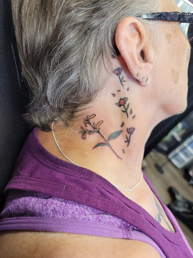 Explore smiley face tattoo ideas, creative tattoo ideas in Platteville, available at Ye Old Tattoo Shoppe, llc