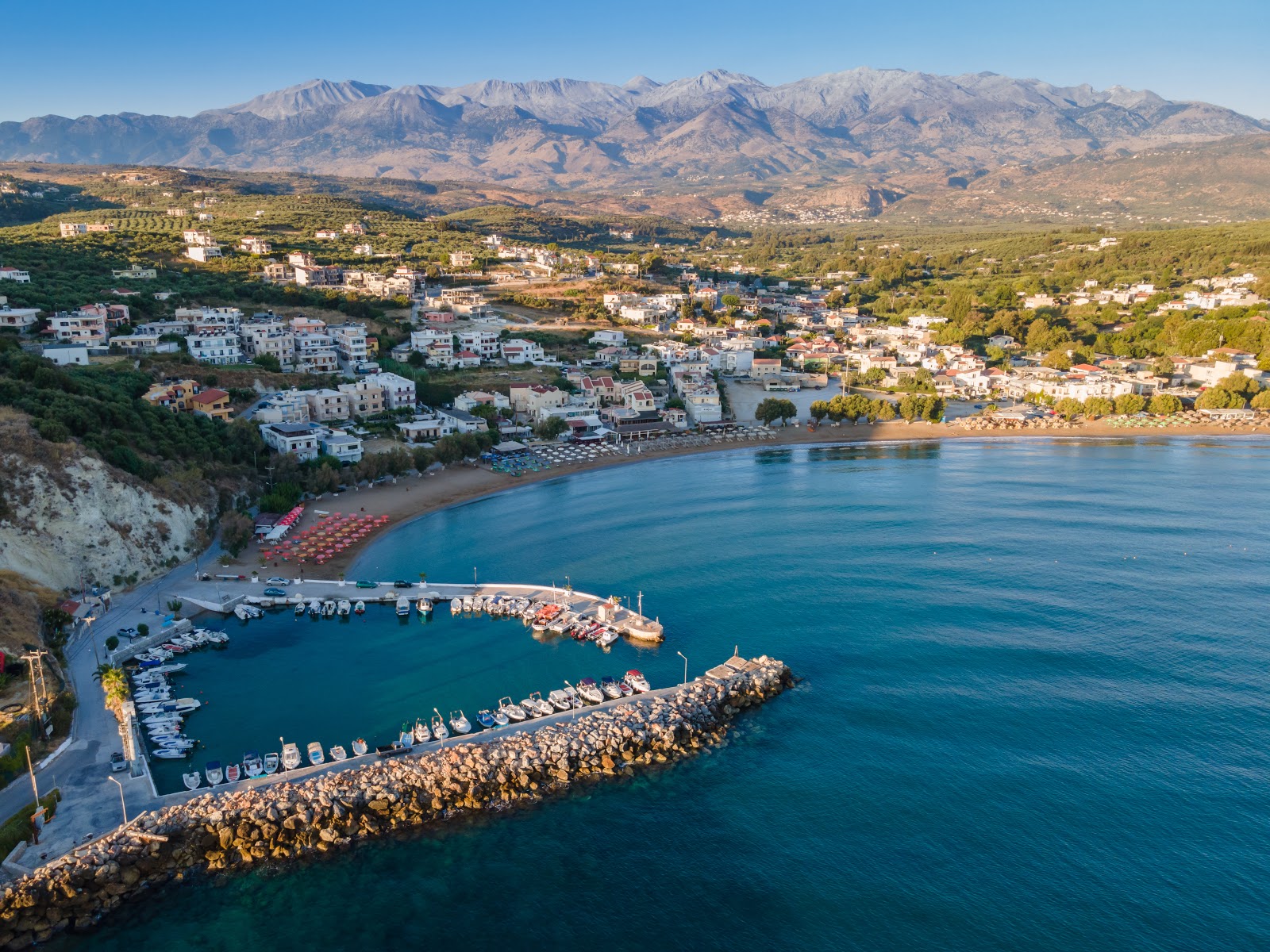 Photo of Paralia Kalives with brown sand surface