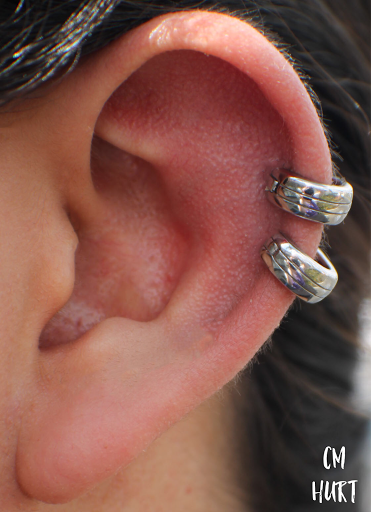 Explore small coraline tattoo ideas, creative tattoo ideas in Garden Grove, available at CM Hurt Piercing & Jewelry