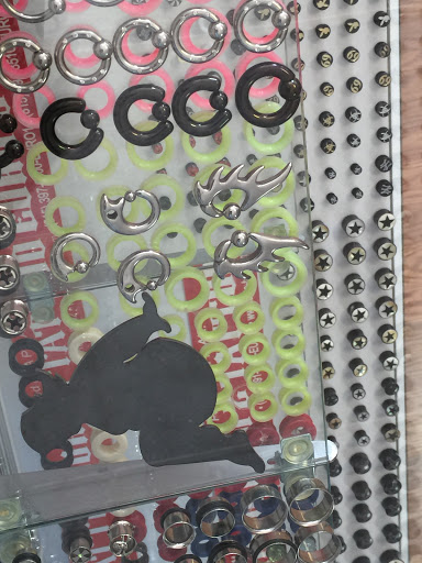 Explore red string tattoo ideas, creative tattoo ideas in Rockford, available at Euro Tattoo