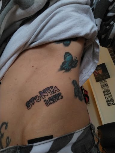 Explore tattoo ideas for breast cancer ribbon, creative tattoo ideas in Norristown, available at IRON TATTOO