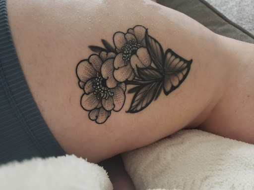 Find tattoo ideas for a mother for your next unique tattoo in Baldwinsville at Grand Line Tattoo