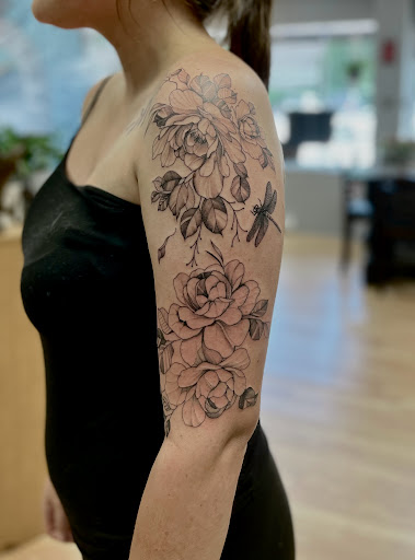 Explore name sleeve tattoo ideas, creative tattoo ideas in Menomonie, available at Blue Dragon Tattoo