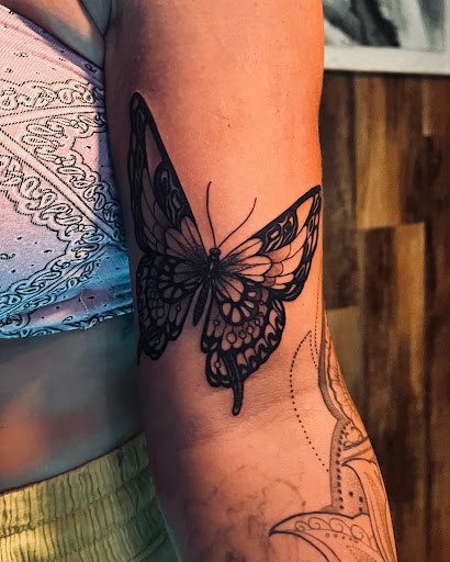 Explore military dog tag tattoo ideas, creative tattoo ideas in Hudson, available at The Bohemian Social Club