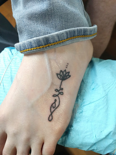 Explore baby footprint tattoo ideas, creative tattoo ideas in Statesville, available at Tattoo Factory of Statesville