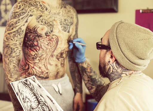 Find robot tattoo ideas for your next unique tattoo in Buffalo at Madd Ink Tattoo & Piercing