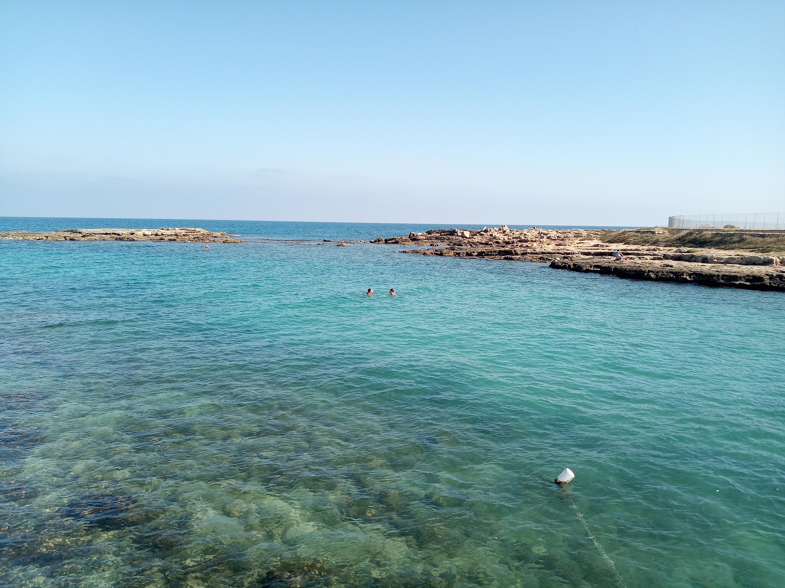 Cala Fetente beach的照片 带有微小的多湾