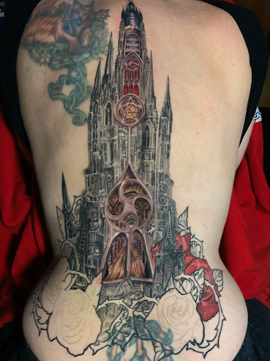Explore lower back tattoo cover up ideas, creative tattoo ideas in Addison, available at Cat Tattoo