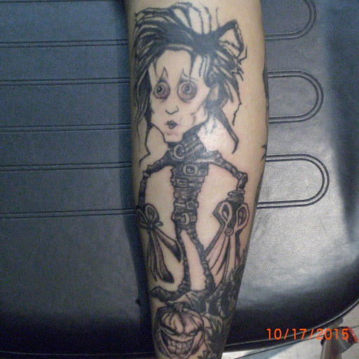 Explore haunted house tattoo ideas, creative tattoo ideas in Bel Air, available at Ink Impressions Tattoo