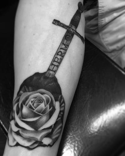 Explore dolphin tattoo ideas for females, creative tattoo ideas in Santa Rosa, available at Eternal Art Tattoo Gallery