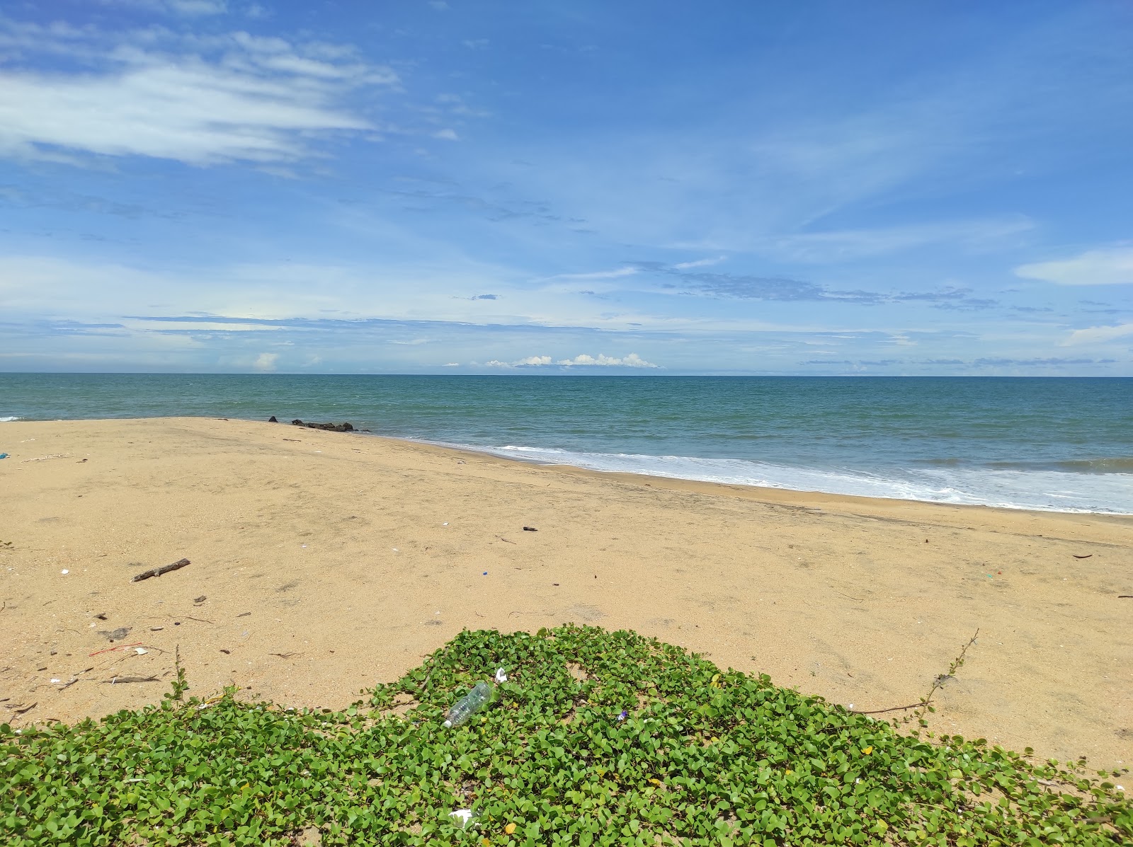 Foto van Golden Beach met turquoise puur water oppervlakte