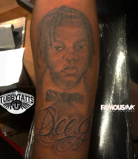 Explore daughter portrait tattoo ideas, creative tattoo ideas in Hammond, available at Famous Ink, Inc.