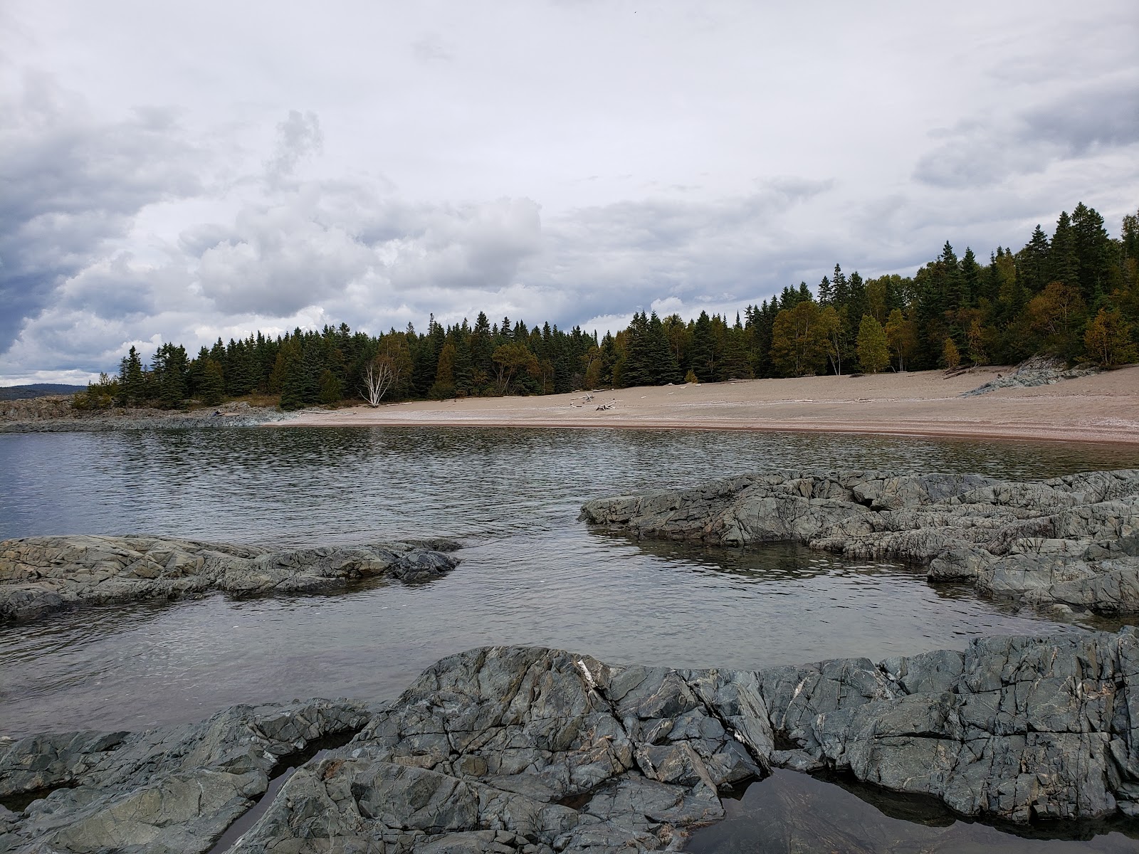 Foto di Government Dock Beach con baia lunga
